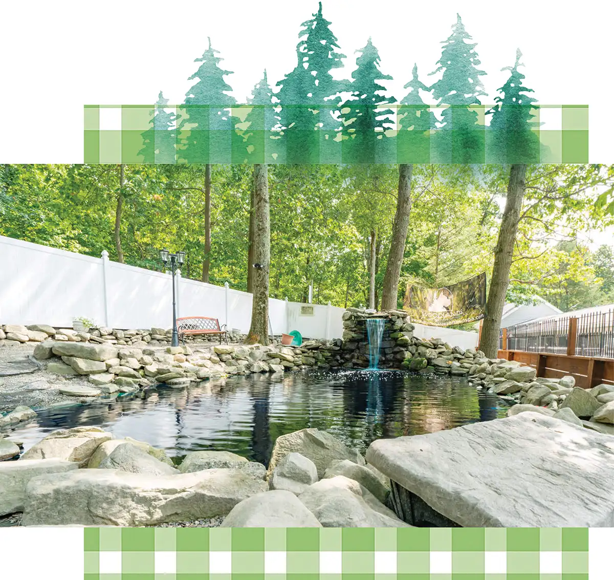 A rock-lined swimming pond with a small waterfall feature in a fenced, tree-shaded outdoor area at a pet resort.
